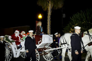 Santa arriving downtown for the White Lighting Ceremony